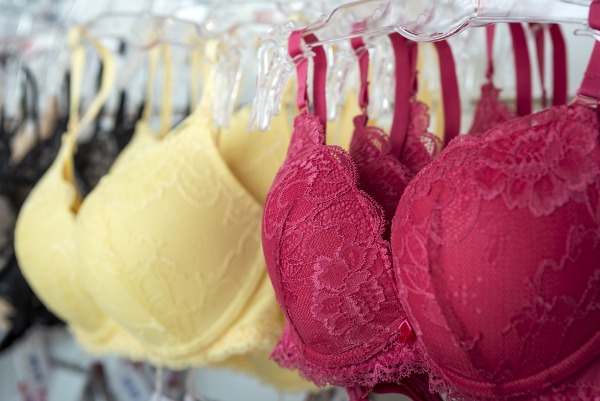 Stop Bra Strap Slipping-Yellow and red bra hanged on display
